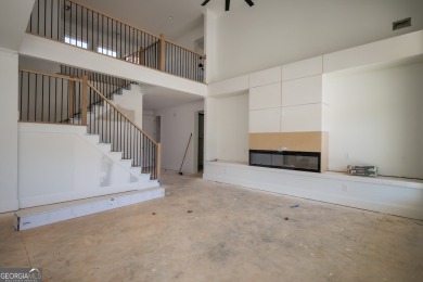 This gorgeous new construction is directly on Osprey Pointe Pond on Harbor Club Golf and Country Club in Georgia - for sale on GolfHomes.com, golf home, golf lot