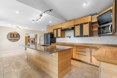 Perfectly positioned in the heart of Palm Coast, yet a world on The Grand Club - Pine Lakes Course in Florida - for sale on GolfHomes.com, golf home, golf lot