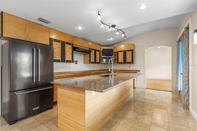 Perfectly positioned in the heart of Palm Coast, yet a world on The Grand Club - Pine Lakes Course in Florida - for sale on GolfHomes.com, golf home, golf lot