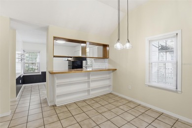 Nestled on a beautiful wooded lot in the Founders Hill on Haile Plantation Golf and Country Club in Florida - for sale on GolfHomes.com, golf home, golf lot