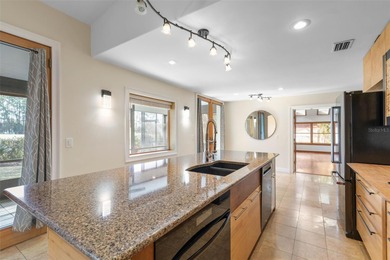 Perfectly positioned in the heart of Palm Coast, yet a world on The Grand Club - Pine Lakes Course in Florida - for sale on GolfHomes.com, golf home, golf lot