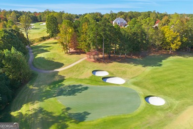 COMMANDING MASSIVE PALATIAL COLUMNS, THIS SUGARLOAF COUNTRY CLUB on TPC At Sugarloaf Golf Club in Georgia - for sale on GolfHomes.com, golf home, golf lot