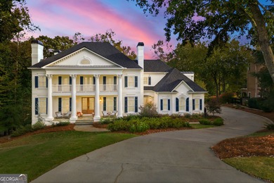 COMMANDING MASSIVE PALATIAL COLUMNS, THIS SUGARLOAF COUNTRY CLUB on TPC At Sugarloaf Golf Club in Georgia - for sale on GolfHomes.com, golf home, golf lot