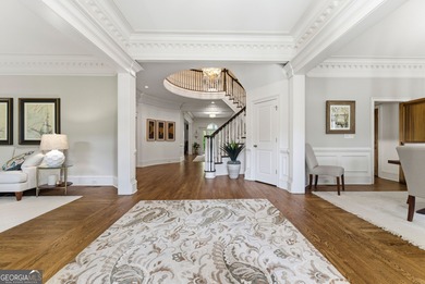 COMMANDING MASSIVE PALATIAL COLUMNS, THIS SUGARLOAF COUNTRY CLUB on TPC At Sugarloaf Golf Club in Georgia - for sale on GolfHomes.com, golf home, golf lot