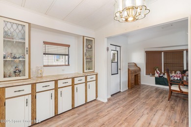 Own a piece of paradise in the resort-style community of on Barefoot Bay Golf Course in Florida - for sale on GolfHomes.com, golf home, golf lot