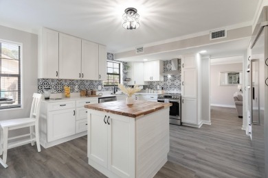 Introducing a completely renovated property that meets all on Shalimar Pointe Golf and Country Club in Florida - for sale on GolfHomes.com, golf home, golf lot