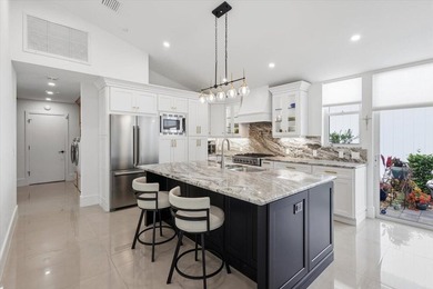 Airy, bright, open-concept 3BR/2.5BA patio home beautifully on Harbour Ridge Yacht and Country Club in Florida - for sale on GolfHomes.com, golf home, golf lot