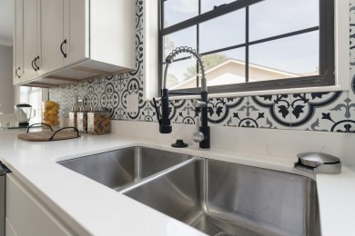 Introducing a completely renovated property that meets all on Shalimar Pointe Golf and Country Club in Florida - for sale on GolfHomes.com, golf home, golf lot