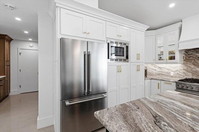 Airy, bright, open-concept 3BR/2.5BA patio home beautifully on Harbour Ridge Yacht and Country Club in Florida - for sale on GolfHomes.com, golf home, golf lot