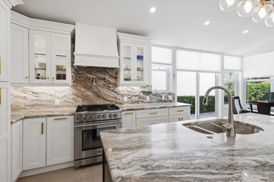 Airy, bright, open-concept 3BR/2.5BA patio home beautifully on Harbour Ridge Yacht and Country Club in Florida - for sale on GolfHomes.com, golf home, golf lot