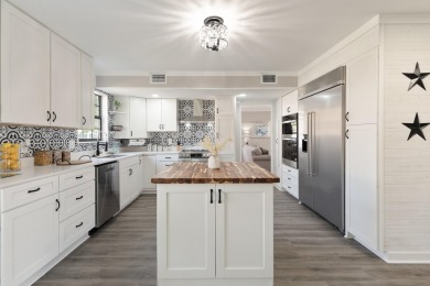 Introducing a completely renovated property that meets all on Shalimar Pointe Golf and Country Club in Florida - for sale on GolfHomes.com, golf home, golf lot