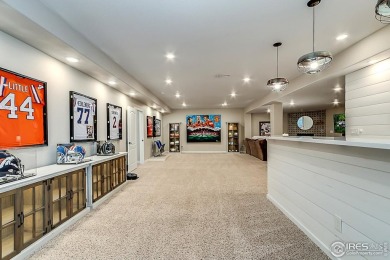 Welcome to this meticulously upgraded ranch-style patio home in on Pelican Lakes Golf and Country Club in Colorado - for sale on GolfHomes.com, golf home, golf lot