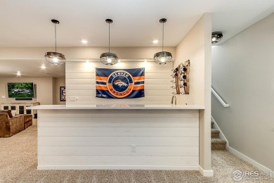 Welcome to this meticulously upgraded ranch-style patio home in on Pelican Lakes Golf and Country Club in Colorado - for sale on GolfHomes.com, golf home, golf lot