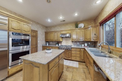 The perfect property for golf lovers nestled in a gated on Tanoan Country Club in New Mexico - for sale on GolfHomes.com, golf home, golf lot