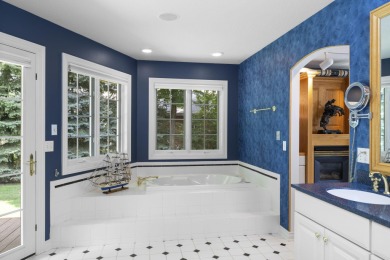 Luxury living in this commanding, quality built 3-bedroom on The Loon Golf Resort in Michigan - for sale on GolfHomes.com, golf home, golf lot