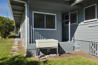 This charming home is located steps from the Hilo Municipal Golf on Hilo Municipal Golf Course in Hawaii - for sale on GolfHomes.com, golf home, golf lot
