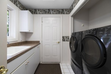 Luxury living in this commanding, quality built 3-bedroom on The Loon Golf Resort in Michigan - for sale on GolfHomes.com, golf home, golf lot