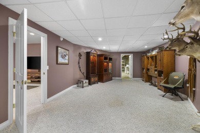 Luxury living in this commanding, quality built 3-bedroom on The Loon Golf Resort in Michigan - for sale on GolfHomes.com, golf home, golf lot