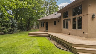 Luxury living in this commanding, quality built 3-bedroom on The Loon Golf Resort in Michigan - for sale on GolfHomes.com, golf home, golf lot
