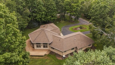 Luxury living in this commanding, quality built 3-bedroom on The Loon Golf Resort in Michigan - for sale on GolfHomes.com, golf home, golf lot