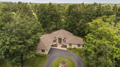 Luxury living in this commanding, quality built 3-bedroom on The Loon Golf Resort in Michigan - for sale on GolfHomes.com, golf home, golf lot