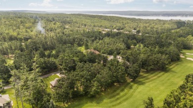 Luxury living in this commanding, quality built 3-bedroom on The Loon Golf Resort in Michigan - for sale on GolfHomes.com, golf home, golf lot