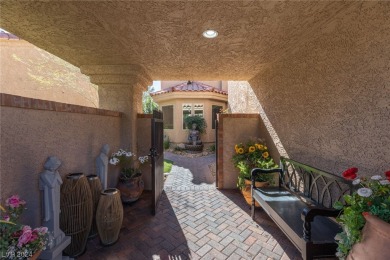 This Spanish Villa impresses with custom wrought iron entry on Spanish Trail Golf and Country Club in Nevada - for sale on GolfHomes.com, golf home, golf lot