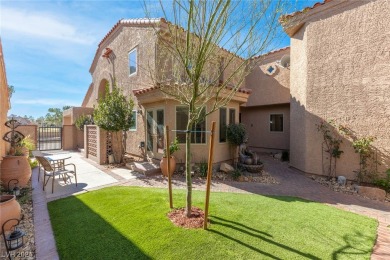 This Spanish Villa impresses with custom wrought iron entry on Spanish Trail Golf and Country Club in Nevada - for sale on GolfHomes.com, golf home, golf lot
