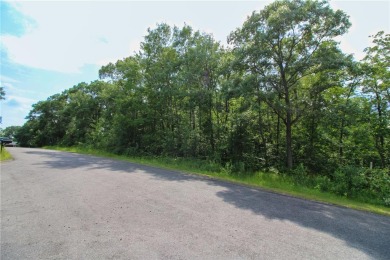 This wooded and conveniently located lot in the heart of Breezy on Breezy Point Golf Course Resort in Minnesota - for sale on GolfHomes.com, golf home, golf lot