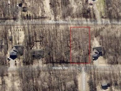 This wooded and conveniently located lot in the heart of Breezy on Breezy Point Golf Course Resort in Minnesota - for sale on GolfHomes.com, golf home, golf lot