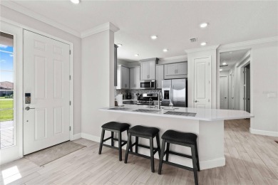 This exquisite Ibis villa is your opportunity to own a slice of on Esplanade Golf and Country at Lakewood Ranch in Florida - for sale on GolfHomes.com, golf home, golf lot