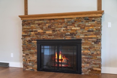 This brilliantly restored home delivers comfort, charm, and on Charlevoix Golf Club in Michigan - for sale on GolfHomes.com, golf home, golf lot