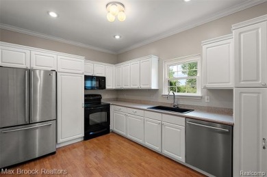 This beautifully maintained condo in the desirable Maples on The Maples Club in Michigan - for sale on GolfHomes.com, golf home, golf lot