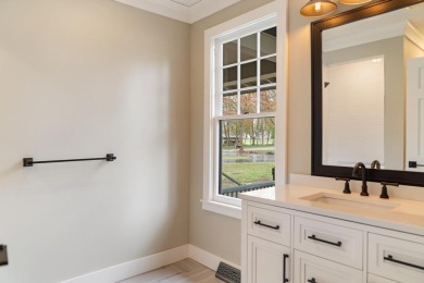 This brilliantly restored home delivers comfort, charm, and on Charlevoix Golf Club in Michigan - for sale on GolfHomes.com, golf home, golf lot