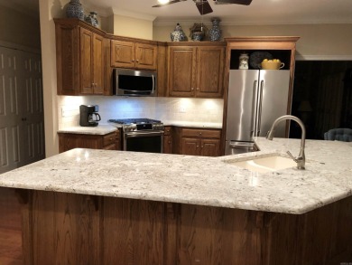 Welcome to this beautiful, rare gem nestled in one of the area's on The Course at River Oaks in Arkansas - for sale on GolfHomes.com, golf home, golf lot