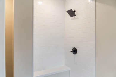 This brilliantly restored home delivers comfort, charm, and on Charlevoix Golf Club in Michigan - for sale on GolfHomes.com, golf home, golf lot