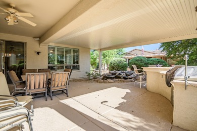 Welcome to your extended Hacienda, a rare 3 bedroom plus den on Sun City Grand Golf Couse and Club in Arizona - for sale on GolfHomes.com, golf home, golf lot