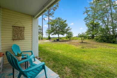 Enjoy the coastal life in this furnished and updated First Floor on Possum Trot Golf Course in South Carolina - for sale on GolfHomes.com, golf home, golf lot