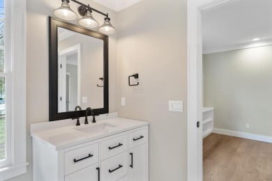 This brilliantly restored home delivers comfort, charm, and on Charlevoix Golf Club in Michigan - for sale on GolfHomes.com, golf home, golf lot
