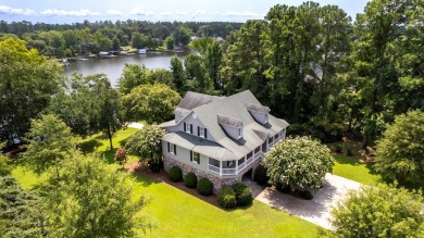 Spectacular 5 BR, 5 BA Lake Marion waterfront home with dock on Players Course At Wyboo Plantation in South Carolina - for sale on GolfHomes.com, golf home, golf lot