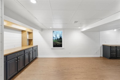 This brilliantly restored home delivers comfort, charm, and on Charlevoix Golf Club in Michigan - for sale on GolfHomes.com, golf home, golf lot