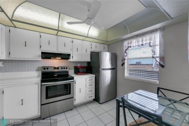 LOVELY  SPACIOUS 2 BED 2 BATH CONDO IN HIGHLY DESIRABLE 55+ on Inverrary Country Club in Florida - for sale on GolfHomes.com, golf home, golf lot