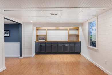 This brilliantly restored home delivers comfort, charm, and on Charlevoix Golf Club in Michigan - for sale on GolfHomes.com, golf home, golf lot