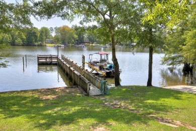 Spectacular 5 BR, 5 BA Lake Marion waterfront home with dock on Players Course At Wyboo Plantation in South Carolina - for sale on GolfHomes.com, golf home, golf lot