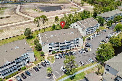 Enjoy the coastal life in this furnished and updated First Floor on Possum Trot Golf Course in South Carolina - for sale on GolfHomes.com, golf home, golf lot