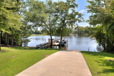 Spectacular 5 BR, 5 BA Lake Marion waterfront home with dock on Players Course At Wyboo Plantation in South Carolina - for sale on GolfHomes.com, golf home, golf lot