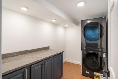 This brilliantly restored home delivers comfort, charm, and on Charlevoix Golf Club in Michigan - for sale on GolfHomes.com, golf home, golf lot