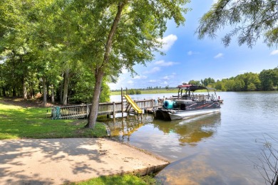 Spectacular 5 BR, 5 BA Lake Marion waterfront home with dock on Players Course At Wyboo Plantation in South Carolina - for sale on GolfHomes.com, golf home, golf lot