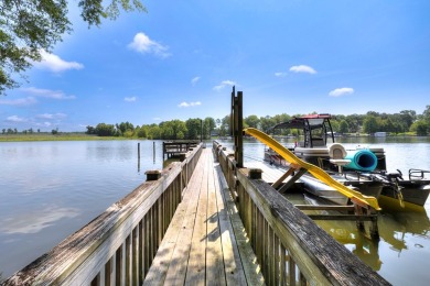 Spectacular 5 BR, 5 BA Lake Marion waterfront home with dock on Players Course At Wyboo Plantation in South Carolina - for sale on GolfHomes.com, golf home, golf lot