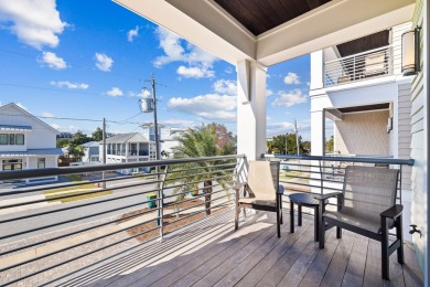 Sleek coastal contemporary design perfectly situated to capture on Kelly Plantation Golf Club in Florida - for sale on GolfHomes.com, golf home, golf lot